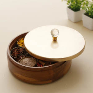 Handcrafted golden teak masala box with multiple compartments, perfect for storing spices and herbs. Durable, eco-friendly, and stylish